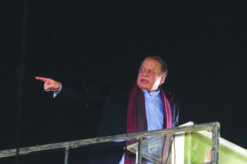 
Nawaz Sharif gestures upon his arrival in Lahore. 