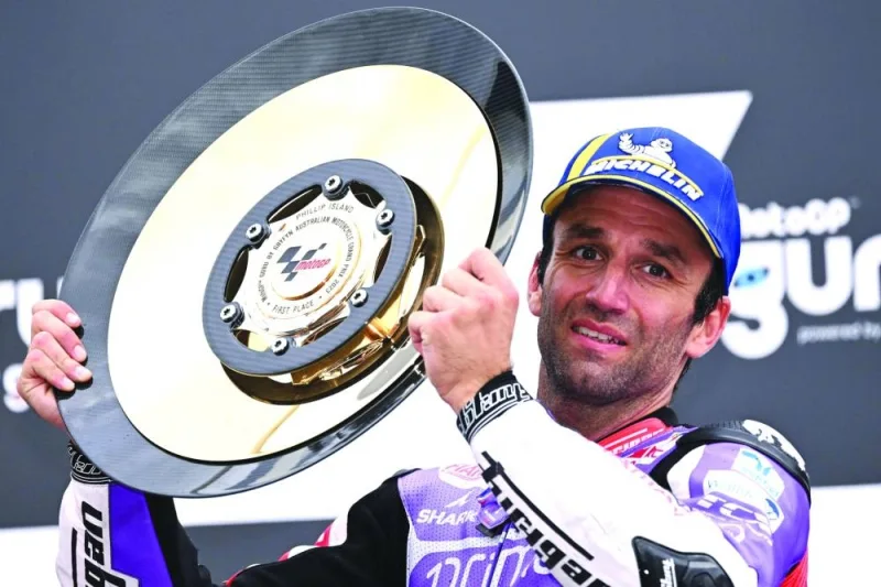 Prima Pramac’s French rider Johann Zarco celebrates with his winning trophy on the podium after the MotoGP Australian Grand Prix at Phillip Island on Saturday. (AFP)