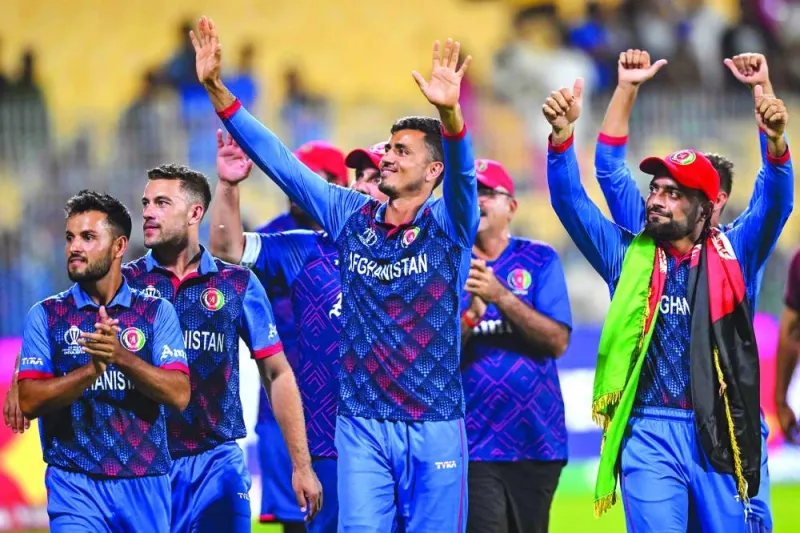 Afghanistan’s players acknowledge their fans at the end of the World Cup match against Pakistan at the MA Chidambaram Stadium in Chennai on Monday. (AFP)