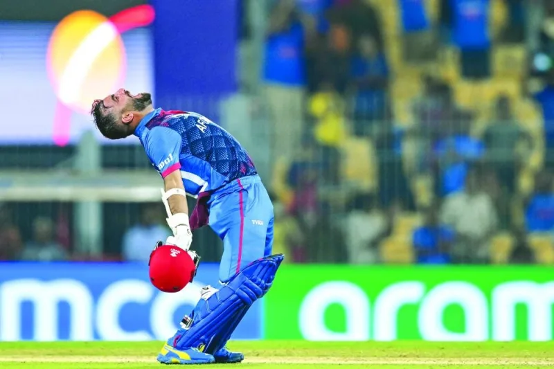 Afghanistan’s captain Hashmatullah Shahidi celebrates after winning the World Cup match against Pakistan at the MA Chidambaram Stadium in Chennai on Monday. (AFP)