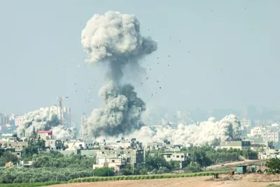 A picture taken from the southern Israeli city of Sderot yesterday shows smoke and debris ascending over the northern Gaza Strip following an Israeli strike.