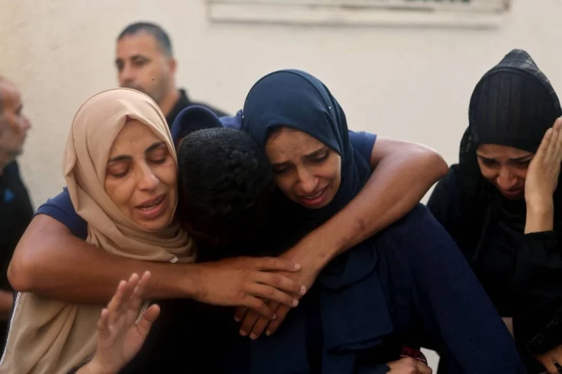 Palestinians mourn loved ones killed in an Israeli strike outside Najjar hospital in Rafah on the southern Gaza Strip on Tuesday. AFP