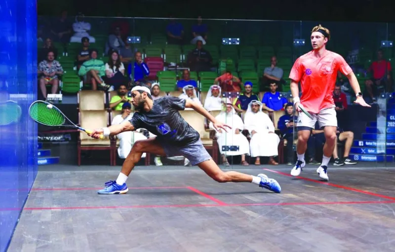 Qatar’s Abdulla Mohamed al-Tamimi (left) in action against Dimitri Steinmann of Switzerland during the quarter-final of QSF 4 2023 tournament currently being played at the Khalifa International Tennis and Squash Complex in Doha on Wednesday.