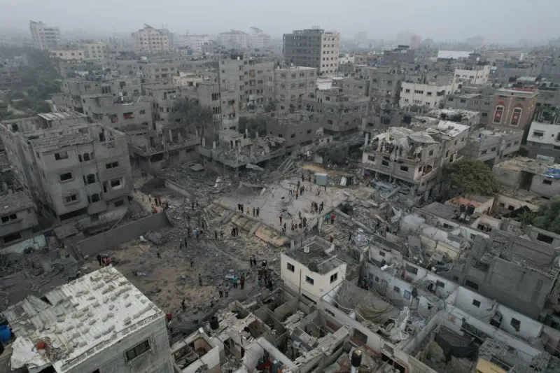 A view of the remains of a mosque and houses destroyed by Israeli strikes in the central Gaza Strip on Sunday. REUTERS