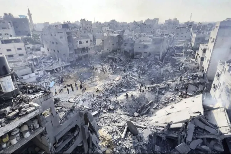 This image grab taken from AFPTV video footage shows Palestinians checking the destruction in the aftermath of an Israeli strike on the Jabalia refugee camp in the Gaza Strip, on Wednesday. AFP