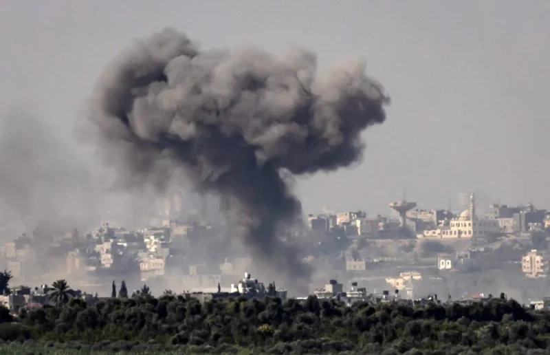 A picture taken from the Israeli side of the border with the Gaza Strip on Friday shows Israeli bombardment in the Gaza Strip. AFP