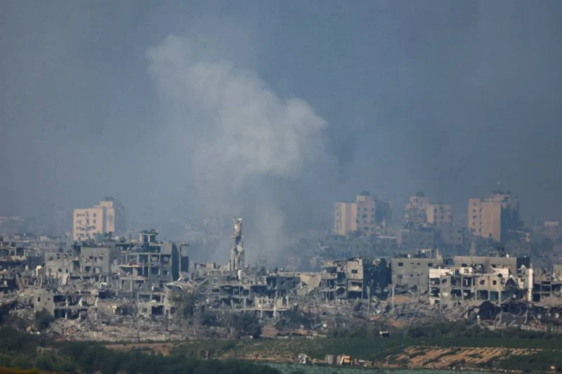 Smoke rises from an Israeli airstrike in the Gaza Strip, as seen from Israel, on Friday. REUTERS