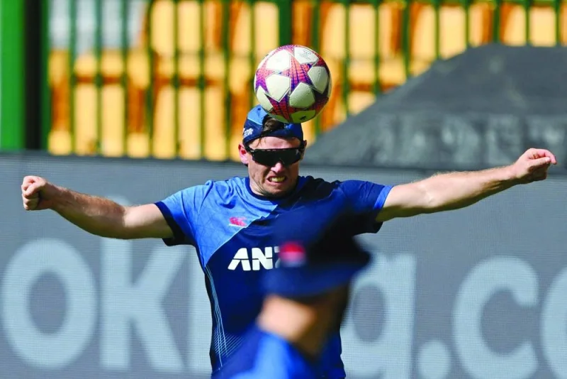 
New Zealand’s Tom Latham plays football during a practice session on the eve of their 2023 ICC World Cup match against Pakistan in Bengaluru. (AFP) 