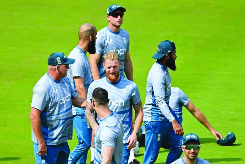 England&#039;s Ben Stokes (centre) along with teammates attends a practice session on the eve of their 2023 ICC World Cup match against Australia in Ahmedabad. (AFP) 