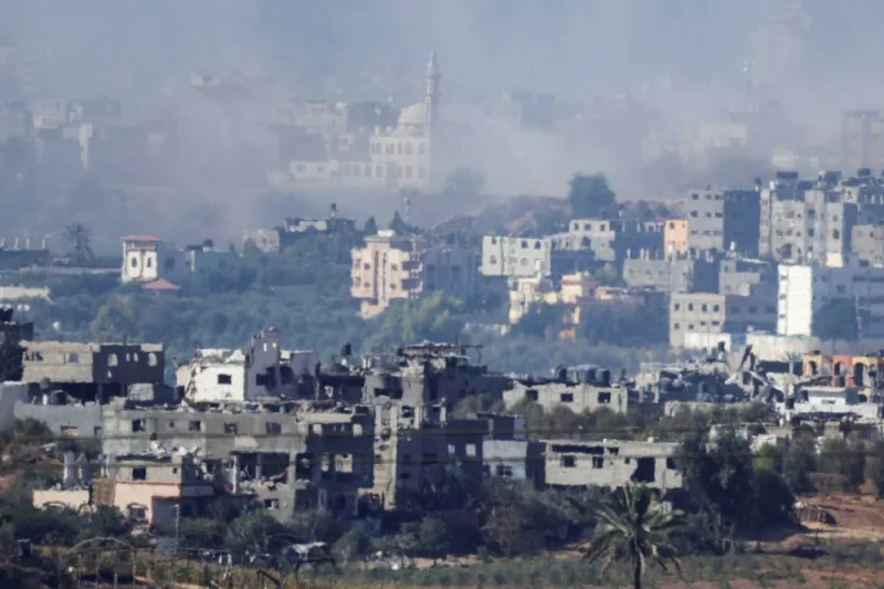 A view of damaged buildings in Gaza, amid the ongoing conflict between Israel and Palestinian Islamist group Hamas, as seen from southern Israel, on Saturday. REUTERS