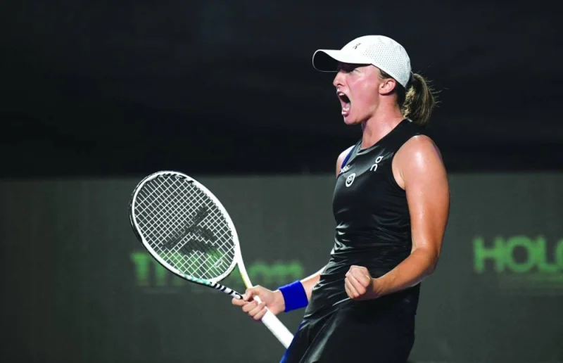 
Poland’s Iga Swiatek celebrates after defeating Belarus’ Aryna Sabalenka during their semi-final at the WTA Finals Championship in Cancun, Mexico. Swiatek won 6-3, 6-2. (AFP) 