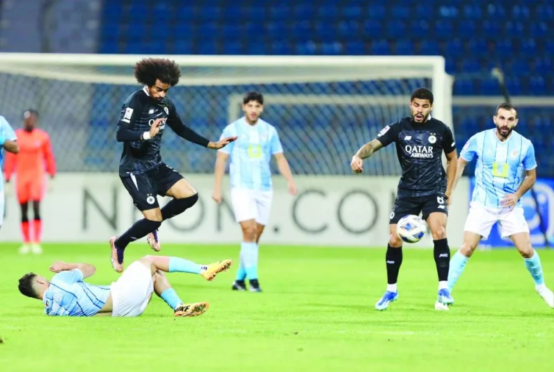 Al Sadd’s Akram Afif goes airborne while going for the ball against Jordan’s Al Faisaly during their AFC Champions League clash in Amman, Jordan, on Monday.