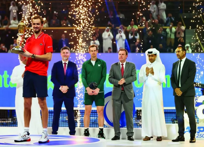 Daniil Medvedev (left) won the Qatar ExxonMobil Open earlier this year, where he beat Andy Murray (in green) in the final at the Khalifa International Tennis and Squash Complex. Qatar Tennis Federation president Nasser al-Khelaifi is also seen in the picture.