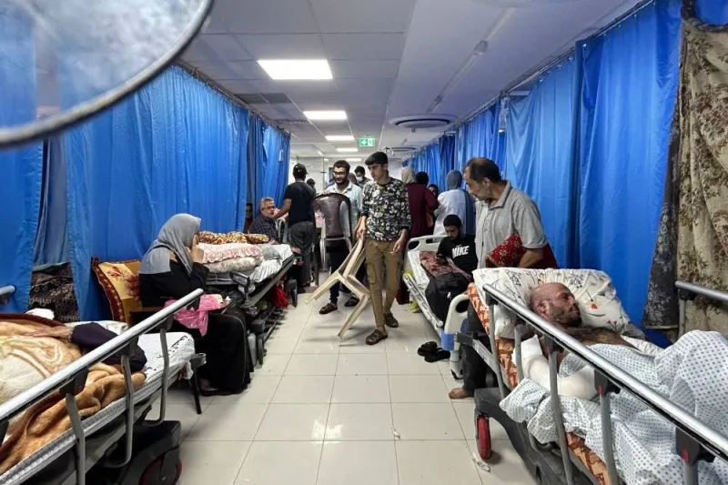 Patients and internally displaced people are pictured at Al-Shifa hospital in Gaza City on November 10. AFP