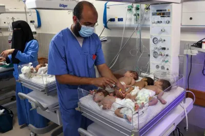  Palestinian medics care for premature babies evacuated from Al Shifa hospital to the Emirates hospital in Rafah in the southern Gaza Strip, on Monday. AFP
