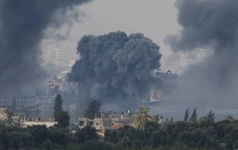 Smoke rises after Israeli air strikes in Gaza, as seen from southern Israel, on Sunday. REUTERS