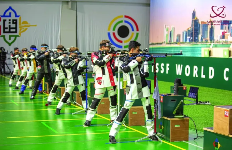 
Shooters aim for the targets during the 10m air rifle men’s final. 