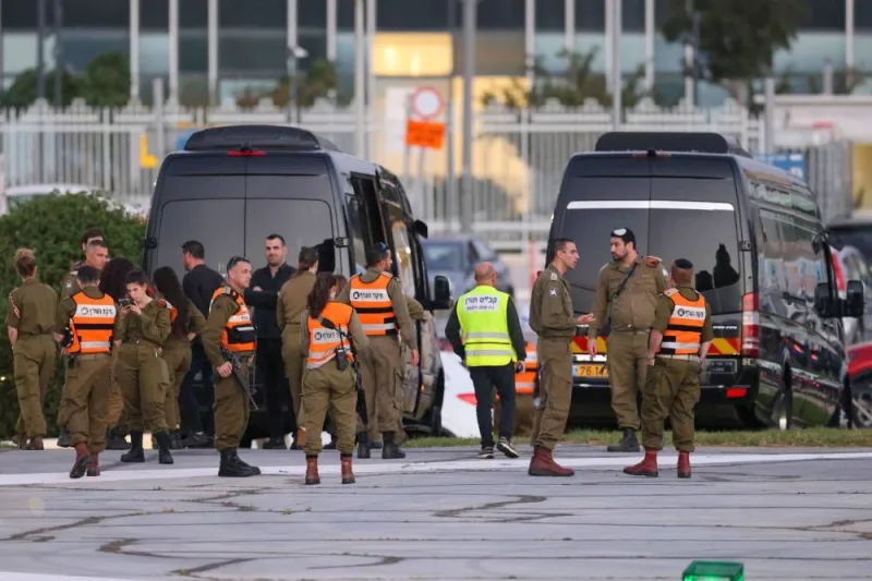 Israeli security forces stand next to buses waiting at the helipad of Tel Aviv&#039;s Schneider medical centre Friday, amid preparations for the release of Israeli hostages held by Hamas in Gaza in exchange for Palestinian prisoners later in the day. AFP