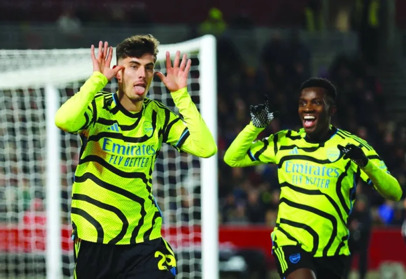 
Arsenal’s Kai Havertz (left) celebrates with teammate Eddie Nketiah after scoring against Brentford during the Premier League match at the Brentford Community Stadium in London yesterday. (Reuters) 