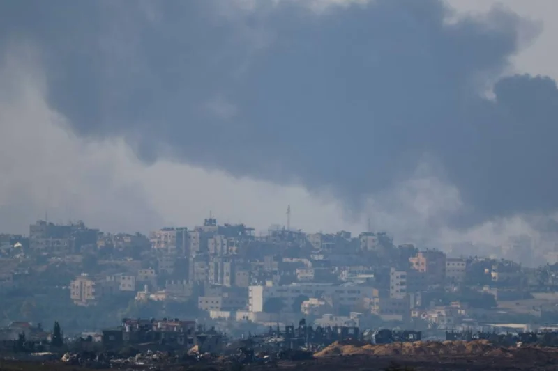 Smoke rises over Gaza following an Israeli strike as seen from southern Israel, on Friday. REUTERS
