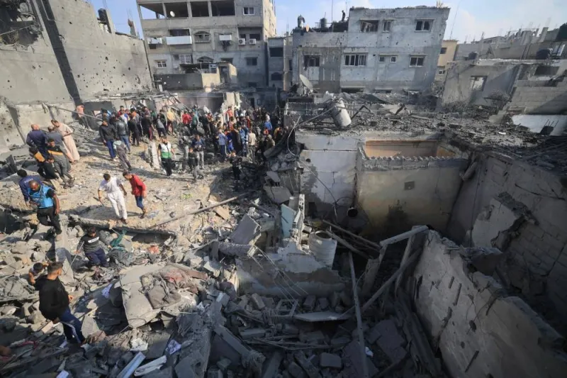 Palestinians check the damage of houses destroyed in an Israeli strike on Khan Yunis in the southern Gaza Strip, on Friday. AFP