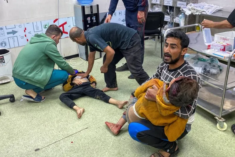 Palestinian children wounded in an Israeli strike are assisted, after a temporary truce between Hamas and Israel expired, at Nasser hospital in Khan Younis in the southern Gaza Strip, on Friday. REUTERS
