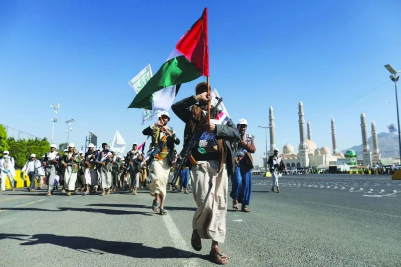 
Newly recruited fighters who joined a Houthi military force intended to be sent to fight in support of the Palestinians in the Gaza Strip, march during a parade in Sanaa, Yemen, yesterday. 