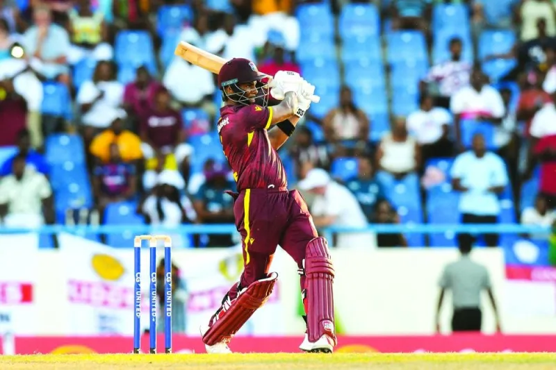 Shai Hope of West Indies hits a 6 to win the first one day international match at Sir Vivian Richards Stadium in North Sound, Antigua and Barbuda, on Sunday. (AFP)
