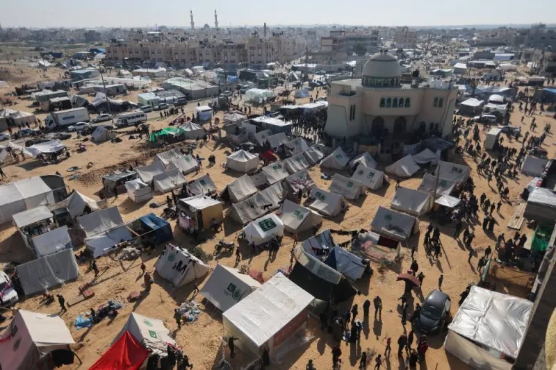 Displaced Palestinians, who fled their houses due to Israeli strike, shelter in a camp in Rafah, in the southern Gaza Strip, Wednesday. REUTERS