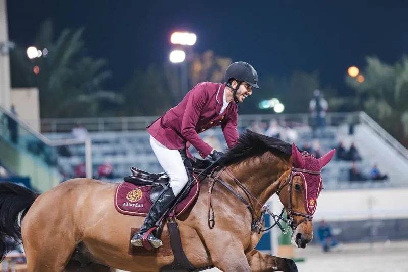 
Mohamed Khalifa al-Baker celebrates with his bay stud Lissabon 56 after winning the Big Tour class during the sixth round of the Longines Hathab - Qatar Equestrian Tour at the outdoor arena of Qatar Equestrian Federation yesterday. 