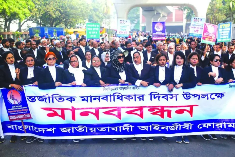 
Lawyers and supporters of Bangladesh Nationalist Party (BNP) gather near the Jatiya Press Club on the occasion of International Human Rights Day yesterday, to demand the release of BNP activists in police custody after they were arrested as part of the nationwide crackdown in Dhaka. 