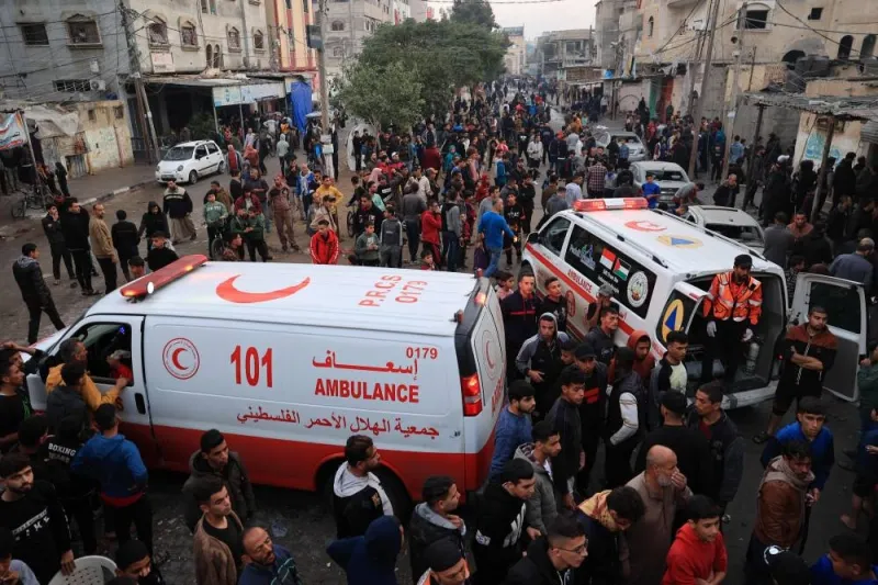 Palestinians react near ambulances following Israeli bombardment in Rafah, in the southern Gaza Strip on Tuesday. AFP