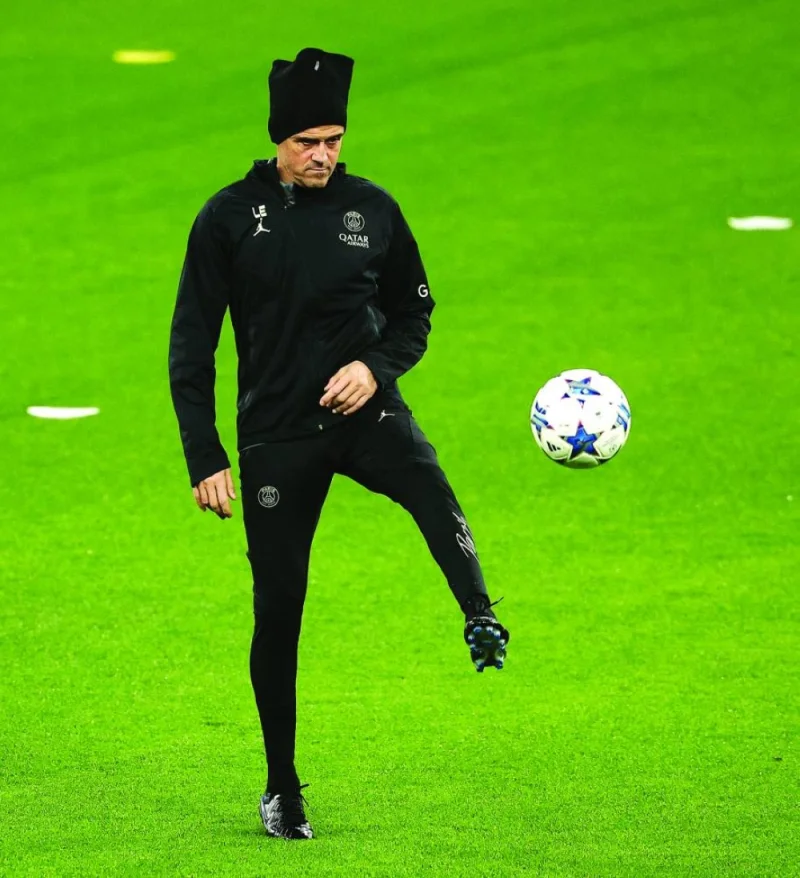 Paris Saint-Germain’s coach Luis Enrique controls the ball during a training session in Dortmund, Germany, yesterday. (AFP)