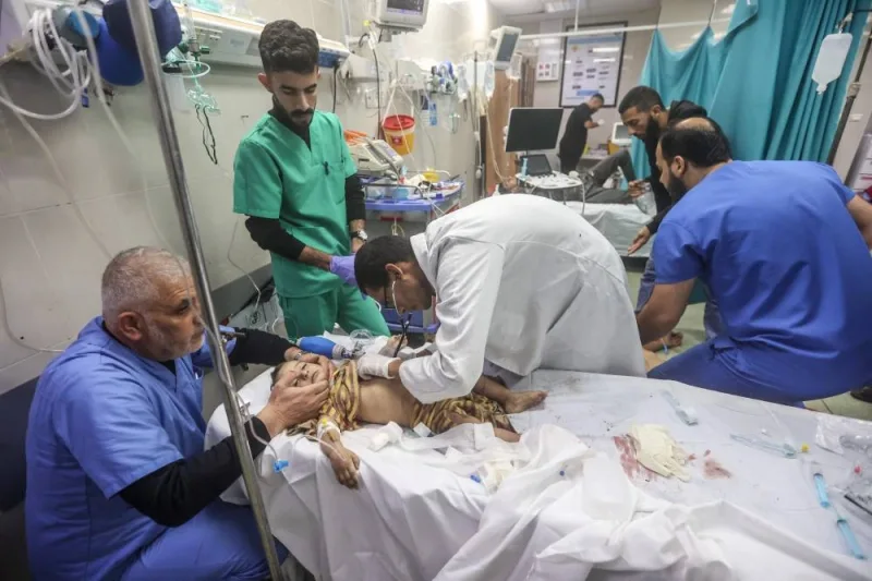 A Palestinian baby receives medical attention at Nasser hospital in Khan Yunis, in the southern Gaza Strip, following Israeli bombardment on Friday. AFP