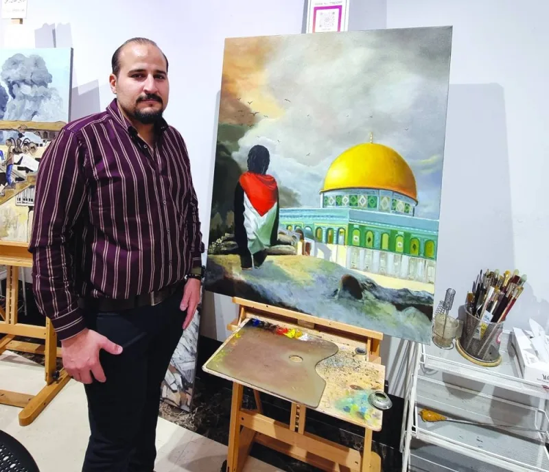 Issa Awad showcases his artwork at Souq Waqif Art Centre. PICTURE: Joey Aguilar