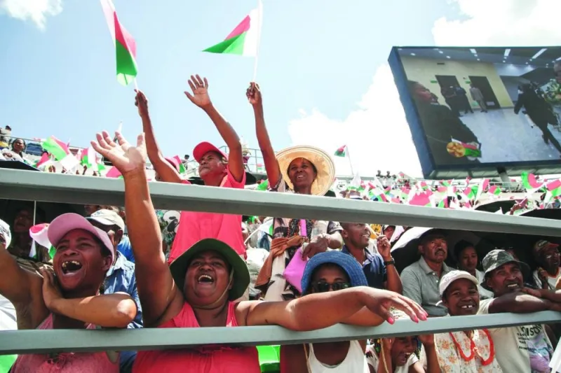 
Supporters react while attending the inauguration ceremony. 
