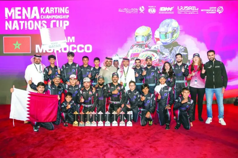 QMMF and LIC President Abdul Rahman bin Abdul Latif al-Mannai and Executive Director of QMMF and CEO of LIC Amro al-Hamad pose with the Qatar team, which finished overall third at the Mena Karting Championship Nations Cup on Saturday.