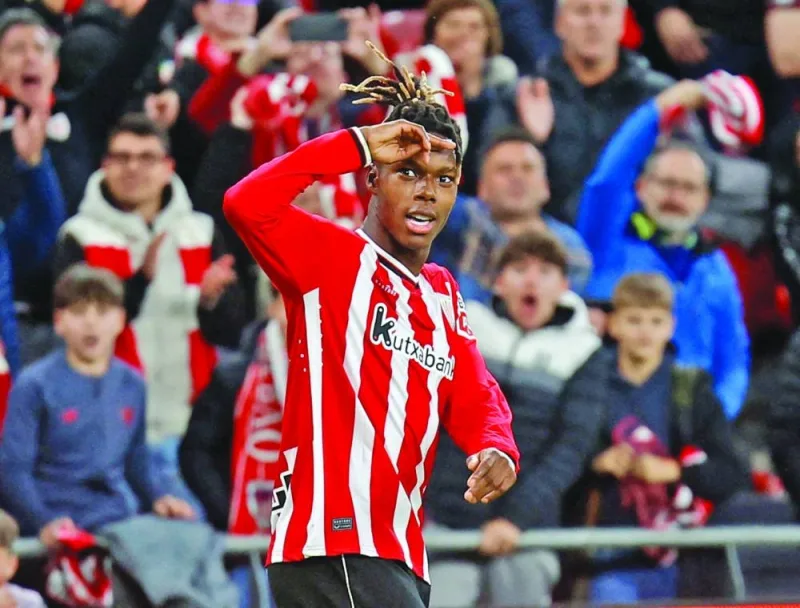Athletic Bilbao’s Nico Williams celebrates scoring their second goal against Atletico Madrid during the La Liga match in Bilbao, Spain, on Saturday. (Reuters)
