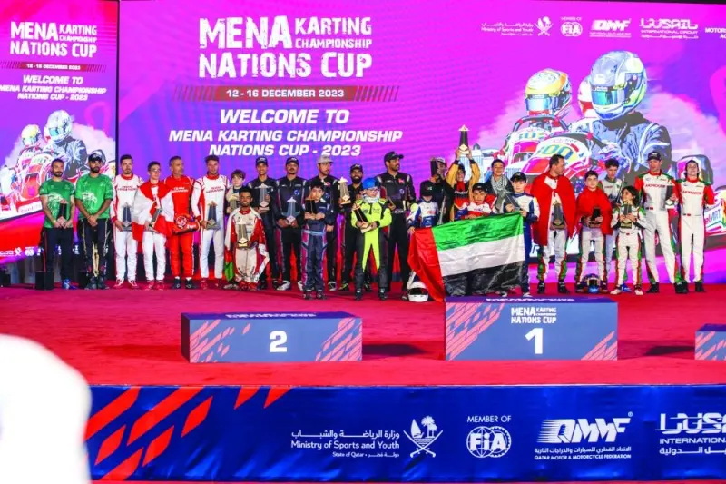 
The podium winners celebrate with their trophies at the closing ceremony of the Mena Karting Championship Nations Cup at the Lusail International Circuit’s karting track. 