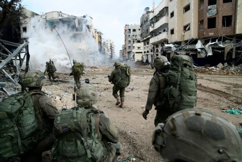 Israeli soldiers operate in the Gaza Strip amid the ongoing conflict between Israel and the Palestinian Islamist group Hamas, in this handout picture released on Monday. Israel Defense Forces/Handout via REUTERS
