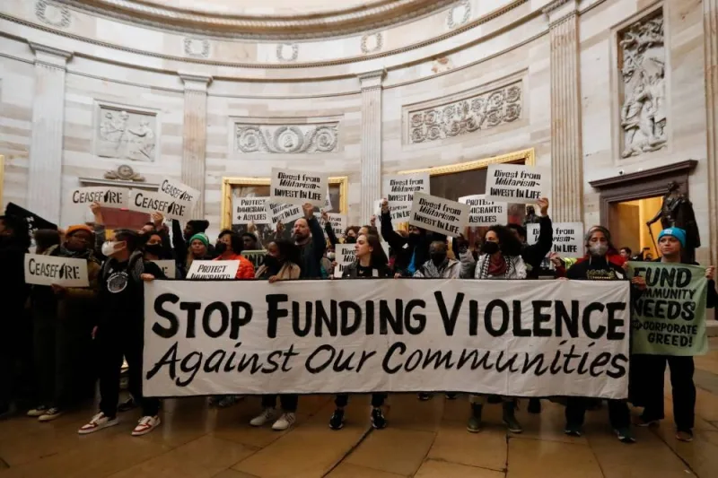Anti-war and anti-violence demonstrators protest in the US Capitol rotunda to call for a permanent ceasefire in Gaza and oppose a military aid package for Israel, in Washington, on Tuesday. REUTERS