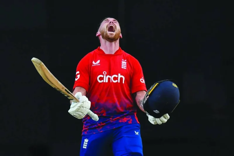 
Phil Salt of England celebrates his century during the 4th T20I against the West Indies at Brian Lara Cricket Academy Stadium in Tarouba, Trinidad and Tobago. (AFP) 