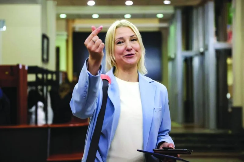 Yekaterina Duntsova arrives at the Central Election Commission to submit documents in Moscow on Wednesday. The election will be held over a three-day period from March 15-17. ( AFP)