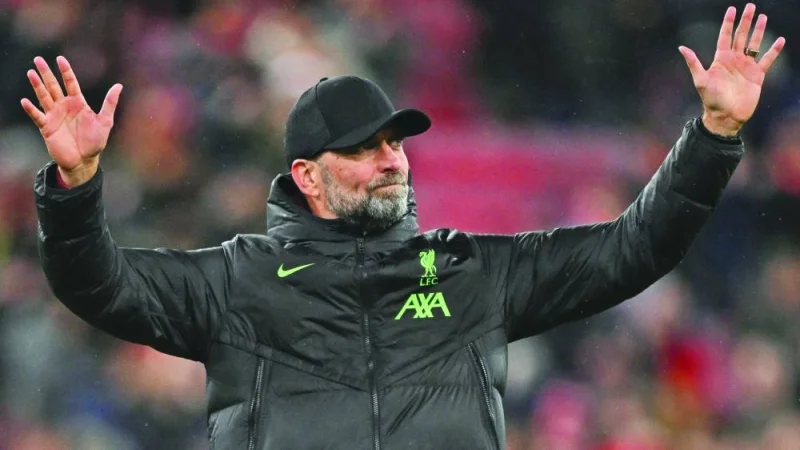 
Liverpool’s German manager Jurgen Klopp celebrates after his team victory at the end of the League Cup quarter-final against West Ham United at Anfield in Liverpool on Wednesday. (AFP) 