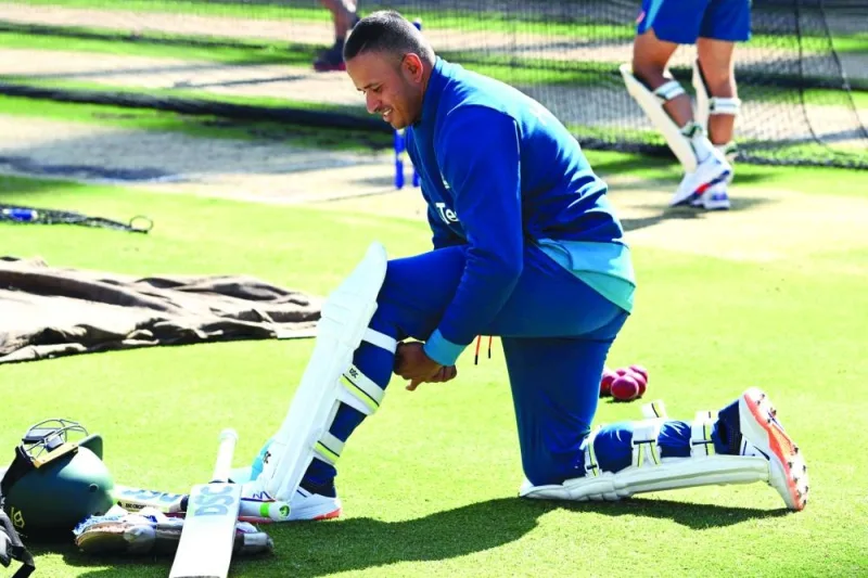 Australian batsman Usman Khawaja prepares to bat in the nets during a practice session at the Melbourne Cricket Ground (MCG) in Melbourne on Sunday, ahead of the second Test match against Pakistan. (AFP)