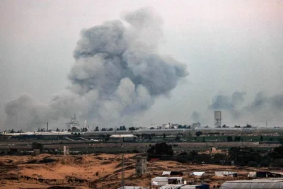 Smoke billows over Khan Yunis from Rafah in the southern Gaza strip during Israeli bombardment on Sunday. AFP