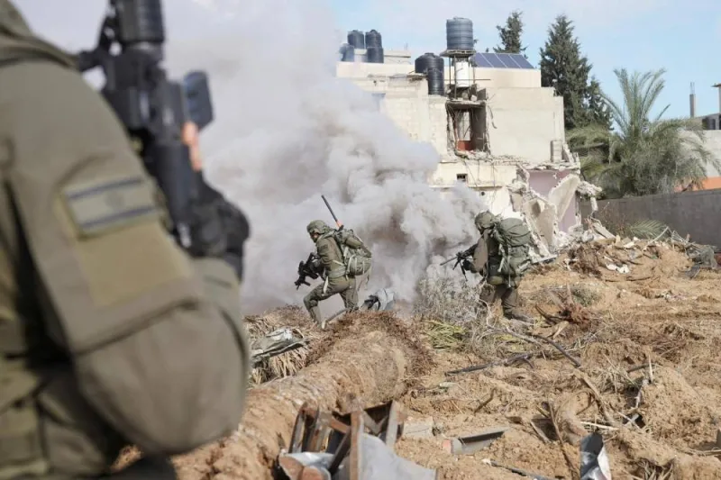 Israeli soldiers operate in the Gaza Strip on Saturday. Israel Defense Forces/Handout via REUTERS
