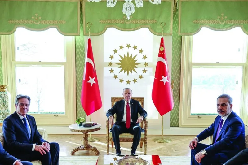 
Turkish President Recep Tayyip Erdogan (centre) meets with US Secretary of State Antony Blinken (left) in the presence of Turkish Foreign Minister Hakan Fidan at the Vahdettin private residence of the presidency in Istanbul. (AFP) 