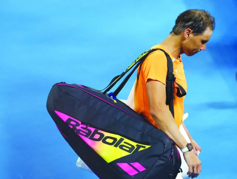 Spain&#039;s Rafael Nadal looks dejected after losing his second round match against Mackenzie Mcdonald of the US at the Australian Open in Melbourne Park, Melbourne, Australia on January 18, 2023. (AFP) 