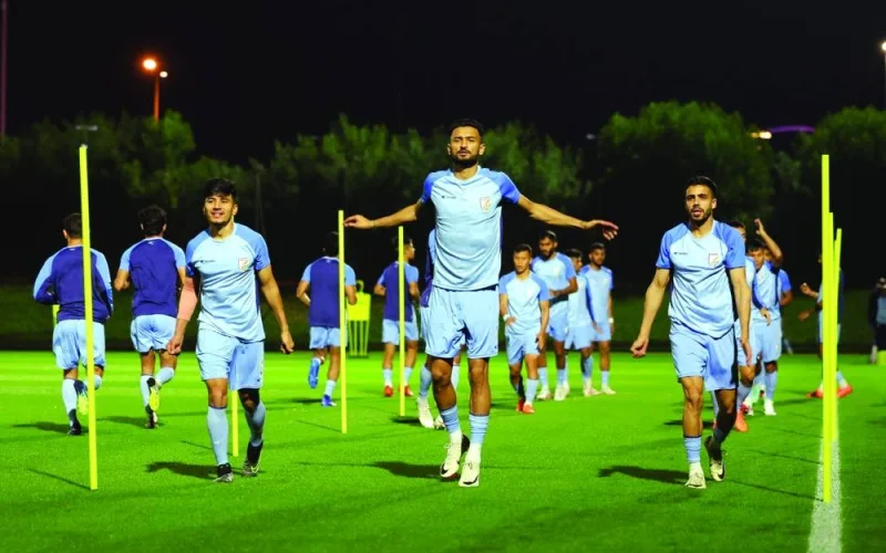 Indian players train in Doha on Monday.  